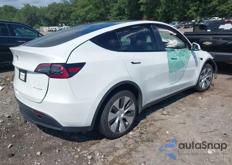 2023 Tesla Model Y Awd/Long Range Dual Motor All-Wheel Drive из США, поврежденный, VIN 7SAYGDEE7PF785948